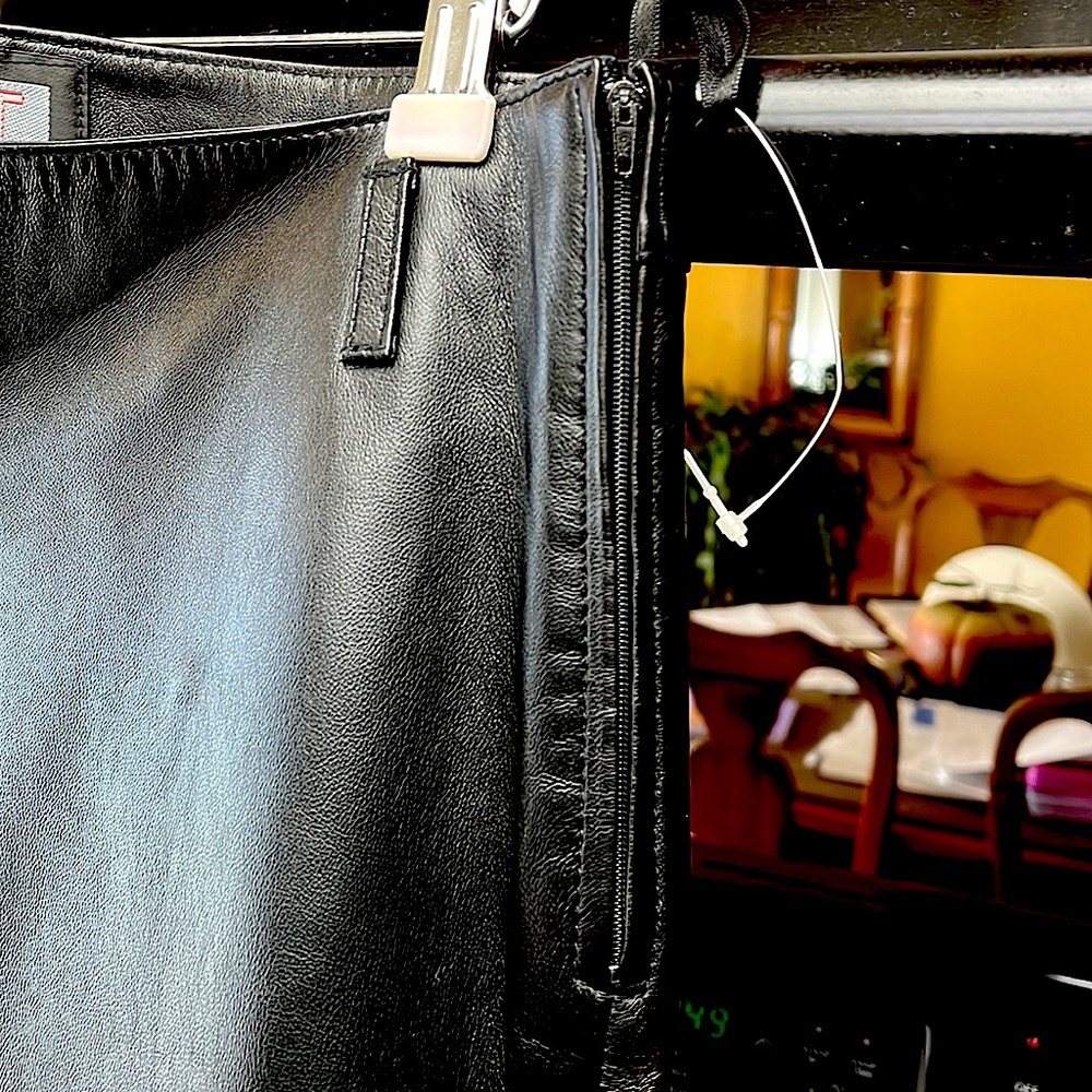 NEW! Genuine black Leather bell bottom Pants size 38 Beautiful! I’m 5’8 127lbs.